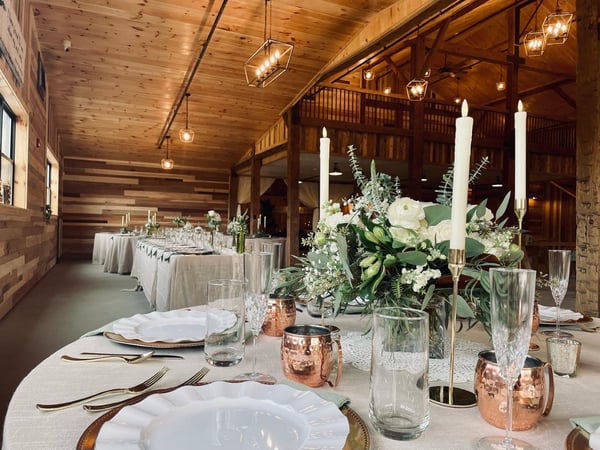 Inside Union Barn with a set wedding table for a reception